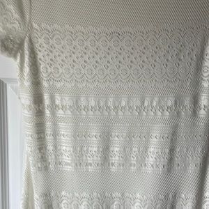 Lace cream dress . Never worn. Price tag on